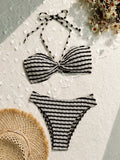 Women's striped bikini swimsuit with brief bottoms in pink or black colours