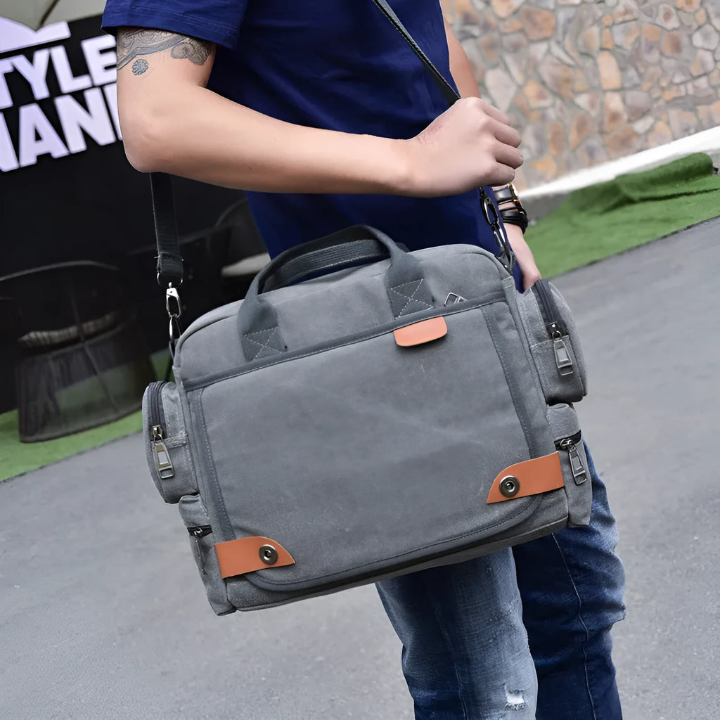 Multi-compartment canvas shoulder bag for men with zipper closure in khaki colour