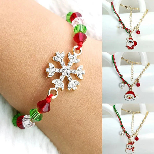 Christmas charm bracelet with snowman, Santa Claus, and snowflake designs