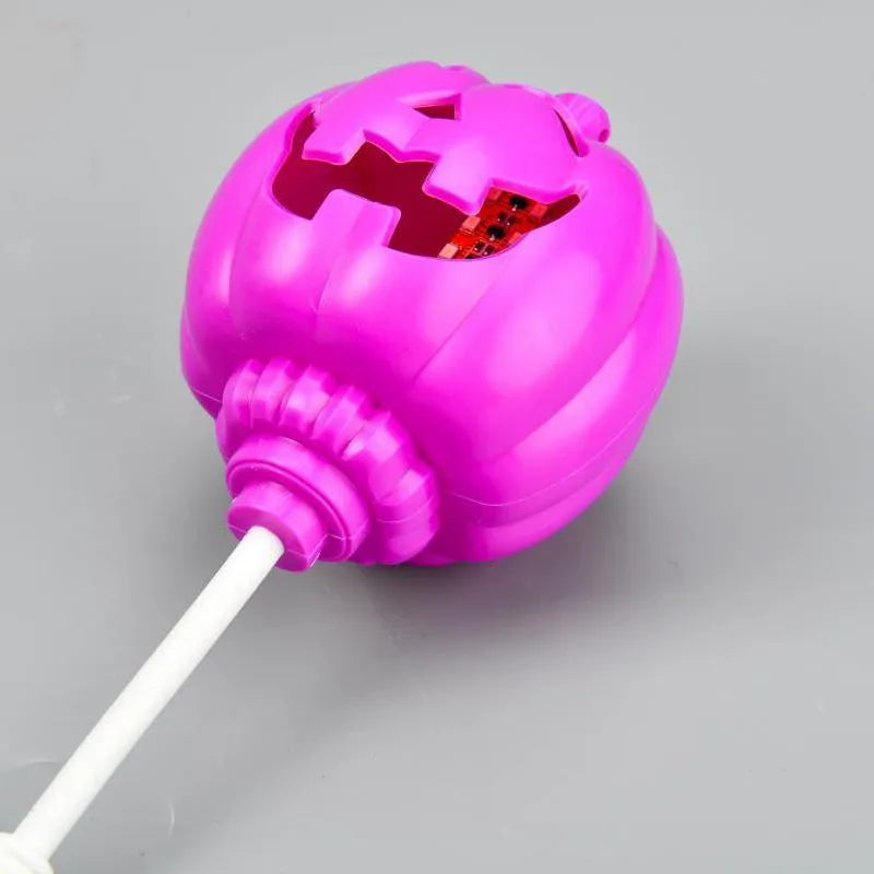USB-powered pumpkin decorative lamp showing purple or yellow light options