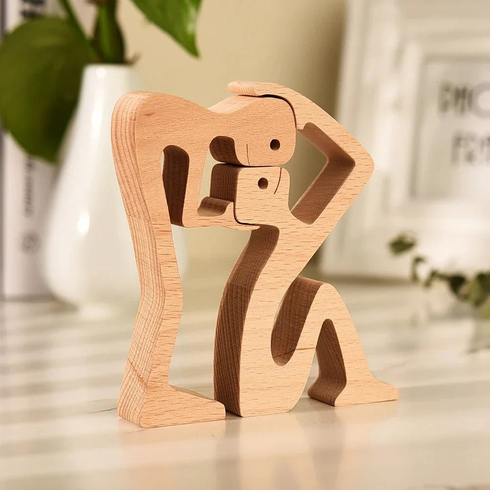 Handcrafted wooden dog sculpture featuring a man and his loyal canine companion