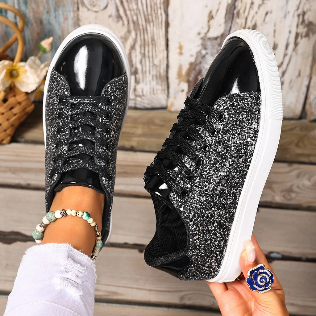 Women's plus size black sequined lace-up board shoes with a flat heel and round toe on a white background