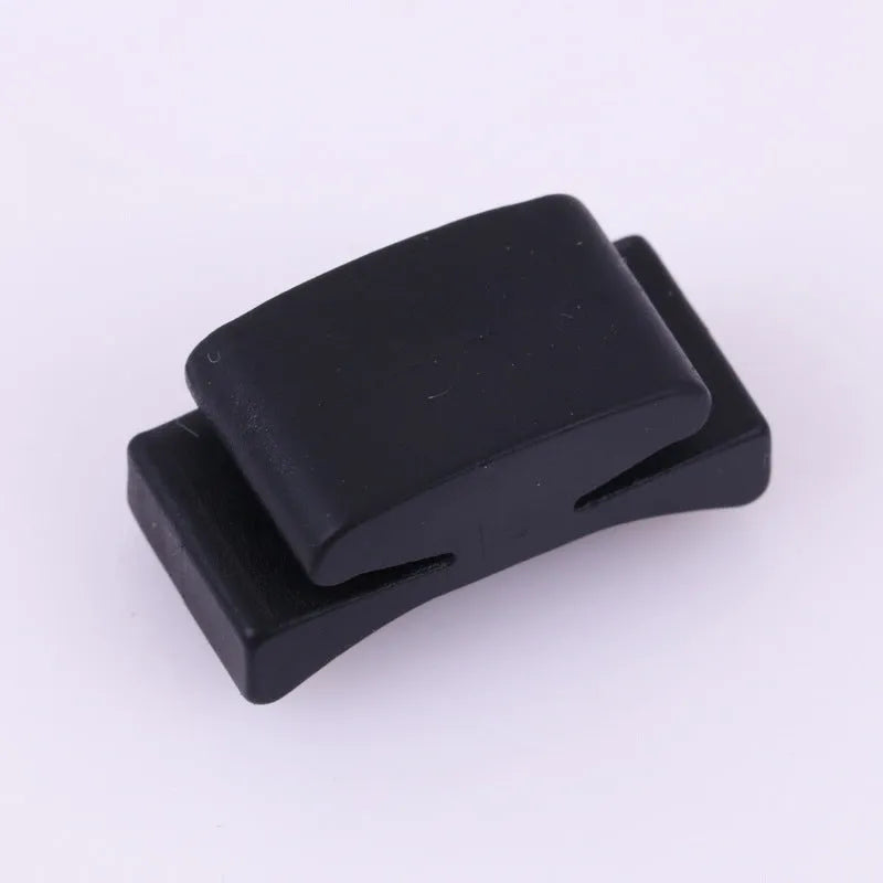Black rubber guitar plectrum holder 2.5cm by 1cm on headstock for plectrum storage