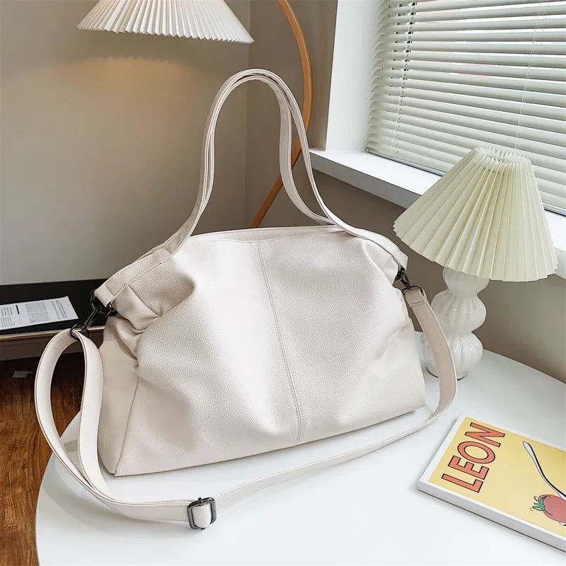 Large soft-surface PU messenger tote bag in a choice of colours, showing internal pockets and adjustable shoulder strap.