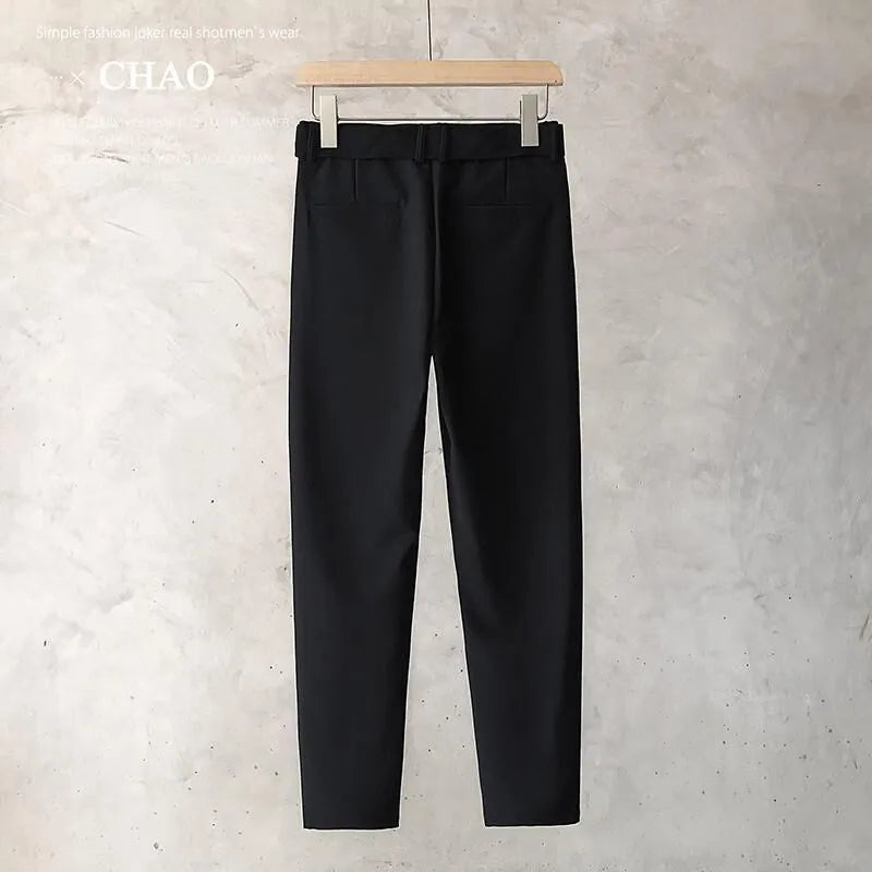 Boys slim straight tapered wool trousers in grey, shown with a straight leg opening.
