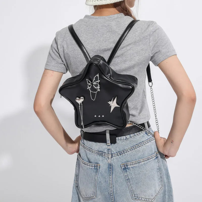 Soft PU leather women's messenger bag worn crossbody, shown in black colour