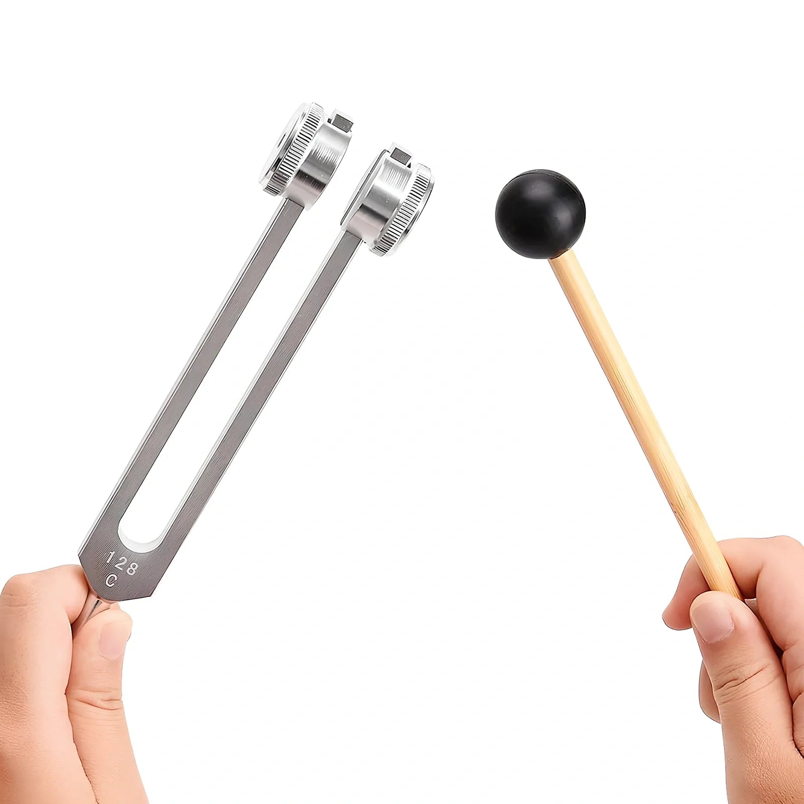 Silver 128 Hz weighted bio-acoustic tuning fork set with hammer, velvet pouch, and accessories for sound therapy