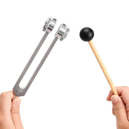 Silver 128 Hz weighted bio-acoustic tuning fork set with hammer, velvet pouch, and accessories for sound therapy