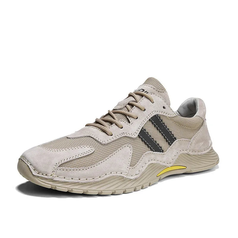 Men's low-top lace-up hiking boots in grey with pigskin upper and platform rubber sole.