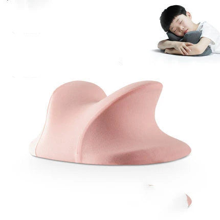 Ergonomic memory foam nap pillow with unique 'butterfly' design for comfortable desk-side power naps