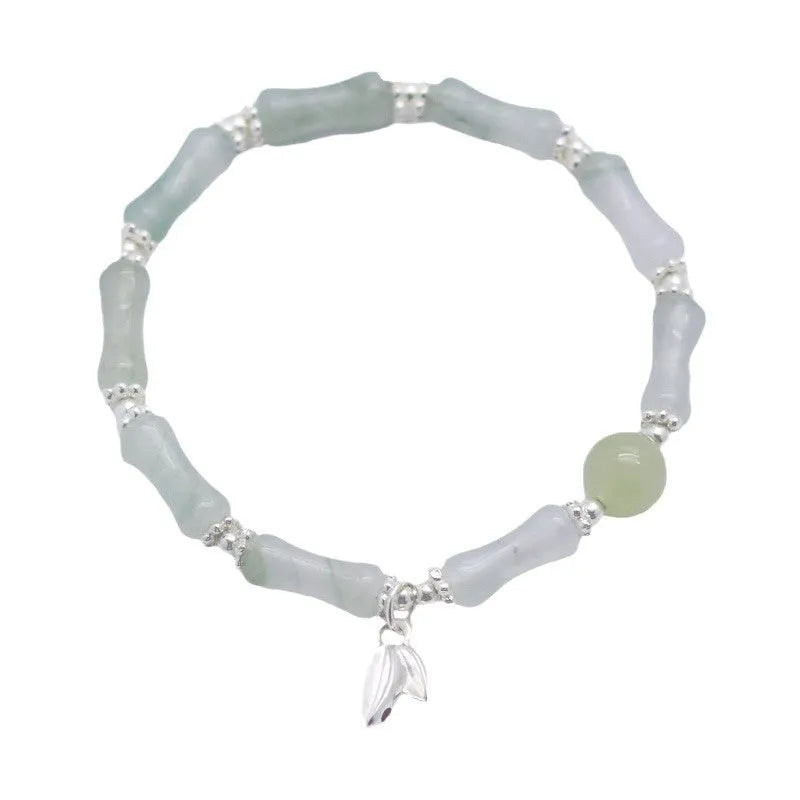 Women's antique-style bracelet made from Tianshan green bamboo and sterling silver with bamboo joint detailing.