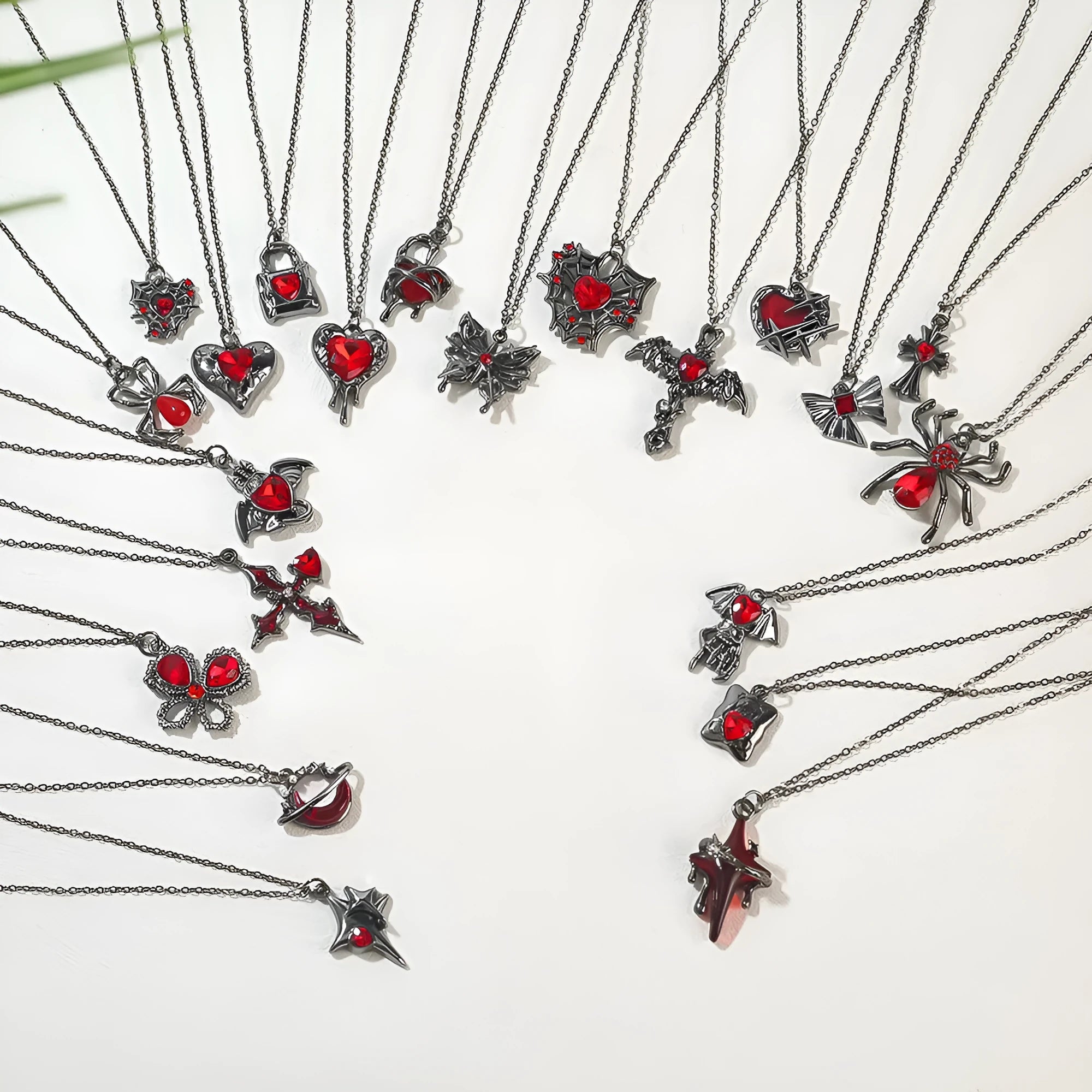 Gothic Halloween necklace with spider and bat pendant designs in electroplated zinc alloy