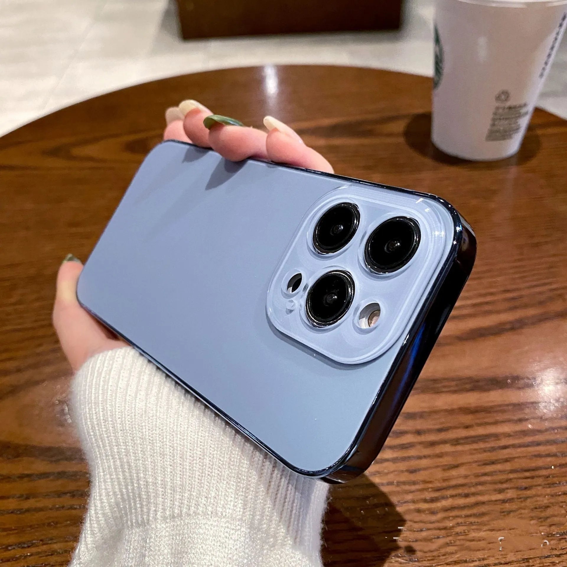 Electroplated TPU frosted acrylic phone case with matte finish for iPhone 11-14 series, showing black front and back against a neutral background