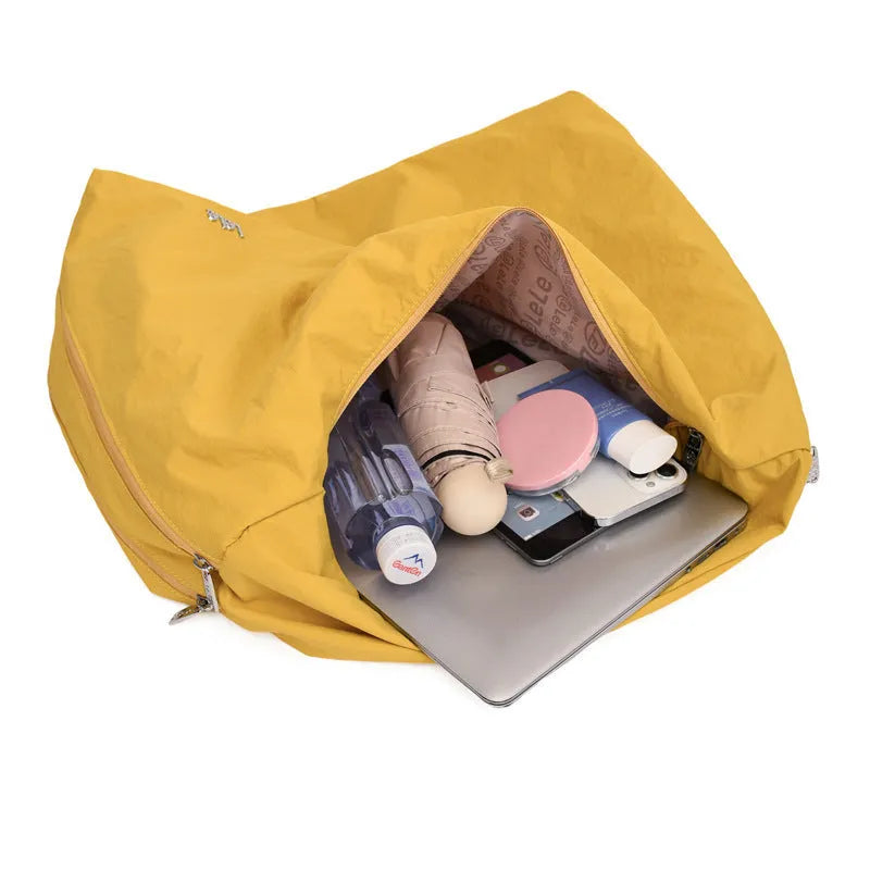 Heart-shaped nylon underarm bag in four colours with crossbody strap