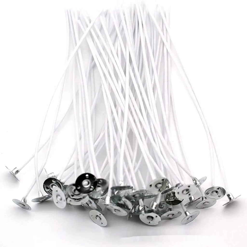 A bundle of white, tightly woven cotton candle wicks in varying lengths for DIY candle making.
