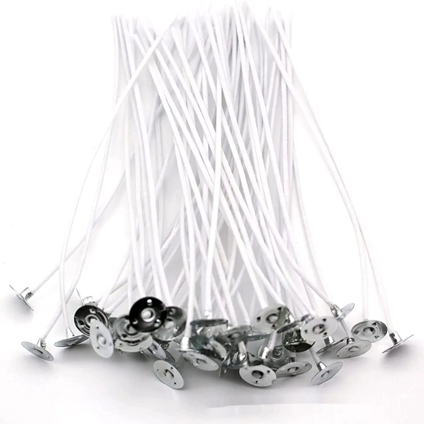 A bundle of white, tightly woven cotton candle wicks in varying lengths for DIY candle making.