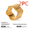 Geometric wave pattern on a stainless steel wide band ring in an electroplated colour finish.