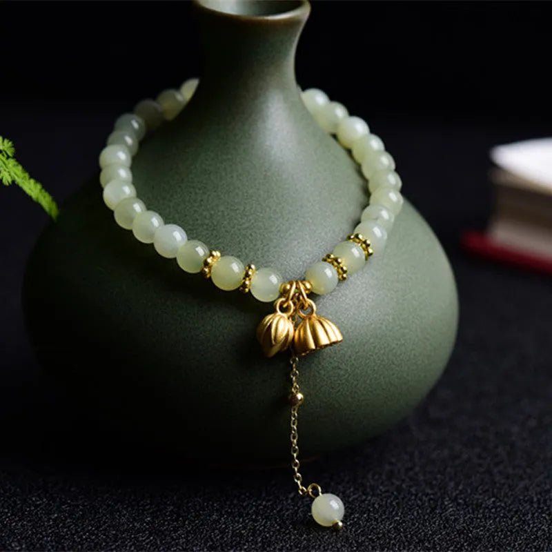 Hetian Jade bracelet with Step by Step Lotus design and Fu character on 6mm beads