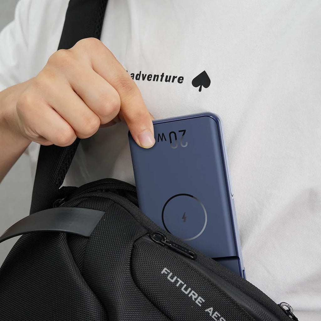 Black industrial-style magnetic wireless power bank showing three-in-one bracket design with 10000mAh capacity