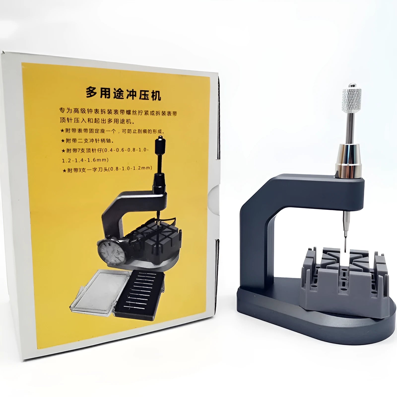 Silver tool steel multi-purpose press strap and pin removal tool on a work surface.