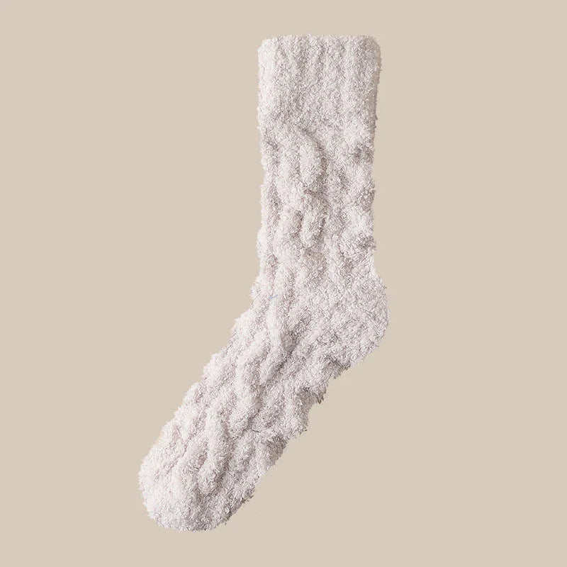 Cozy coral fleece socks in various colors, featuring soft velvet material and anti-slip design for comfort and warmth.