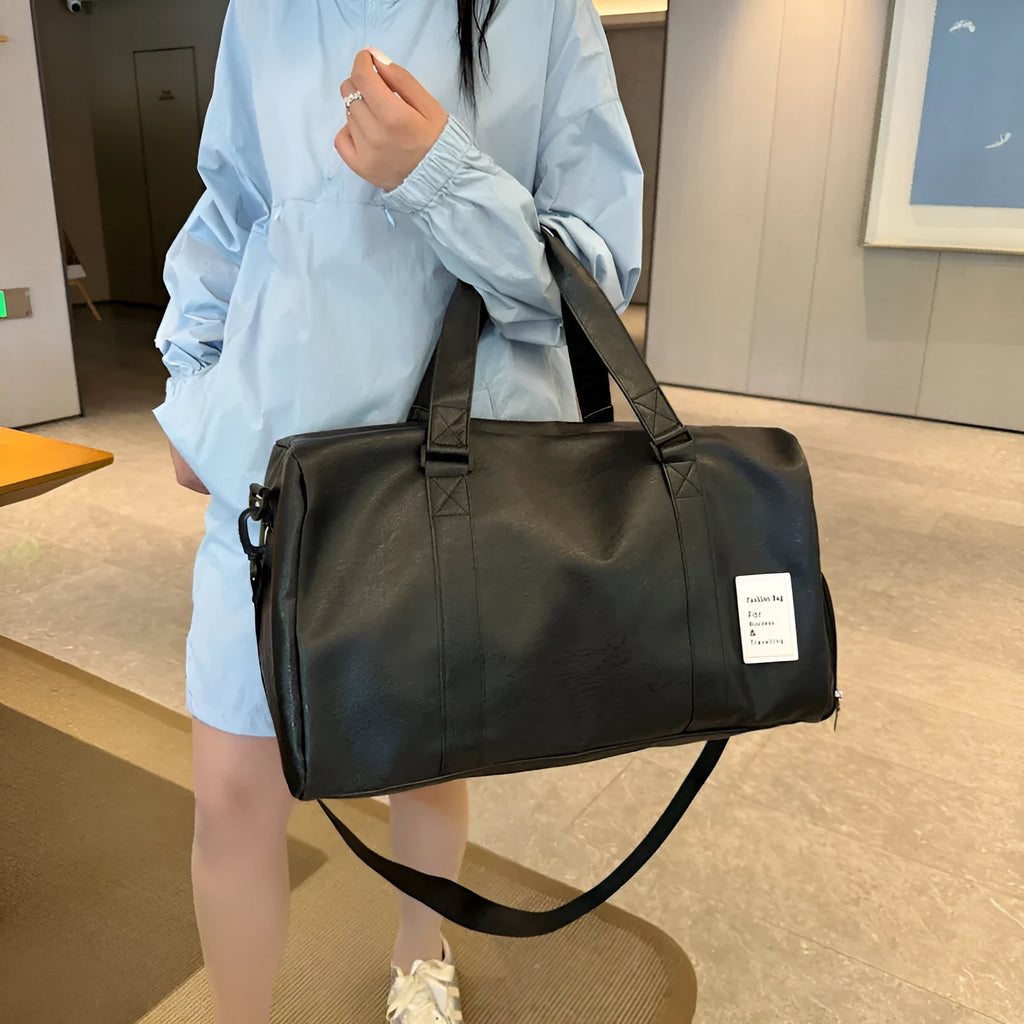 Large and small size dry wet separation PU fitness shoulder messenger bag on a white background.