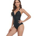 Backless one-piece swimsuit in leopard print on a mannequin, showing European style fit.