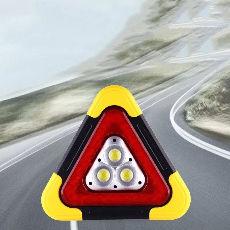 Car mounted tripod warning sign light with solar panel, large and small sizes, showing warning flash mode on a roadside