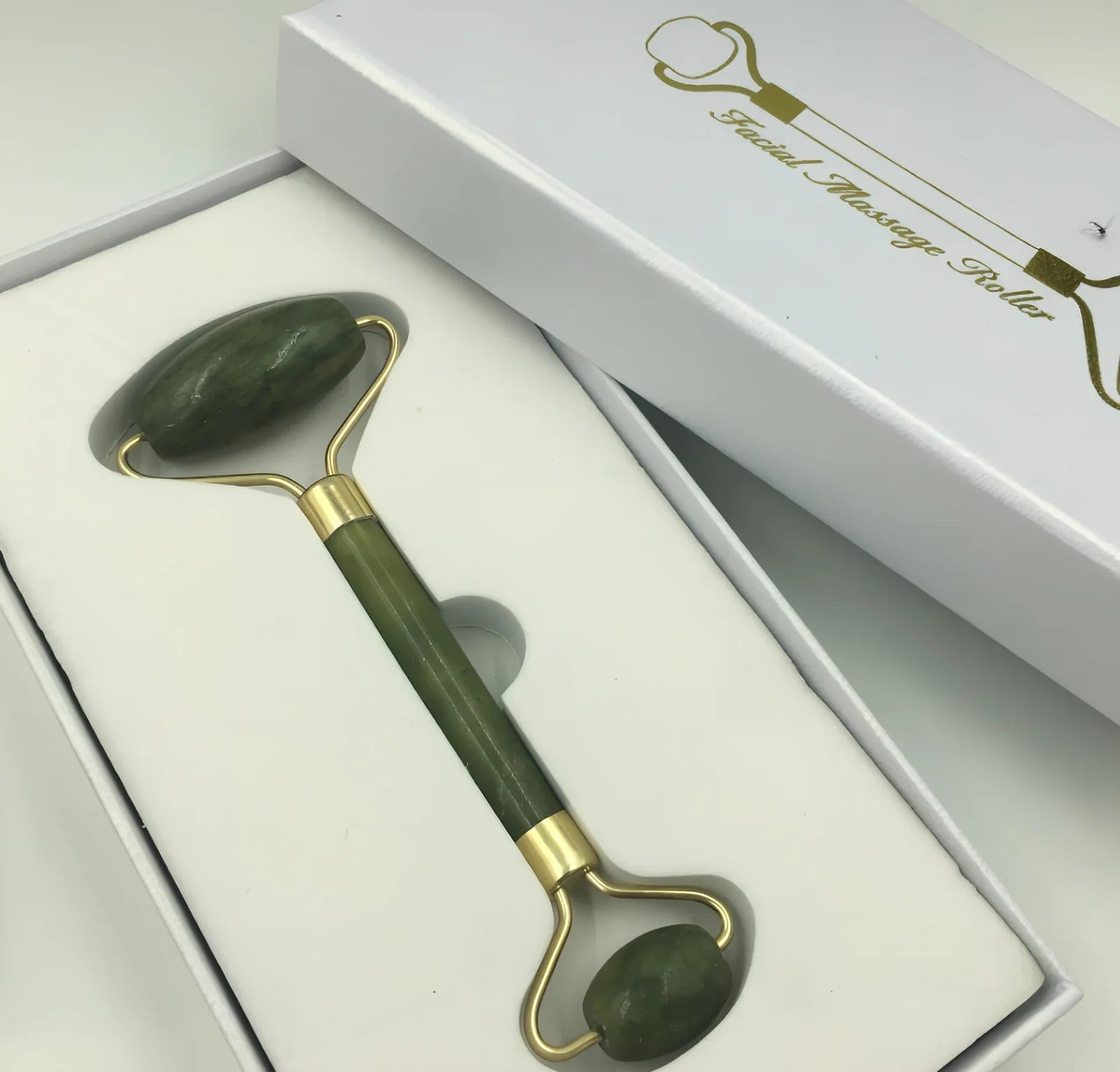 Double-headed Xiuyu jade facial massage roller, 20 cm long, for skin decongestion and cooling relief