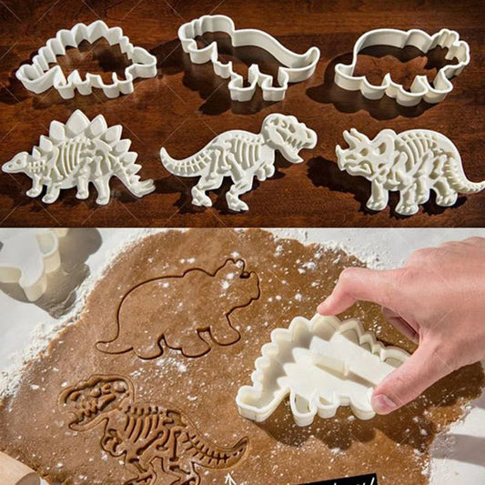 Dinosaur-shaped cookie cutter molds in various prehistoric-themed designs