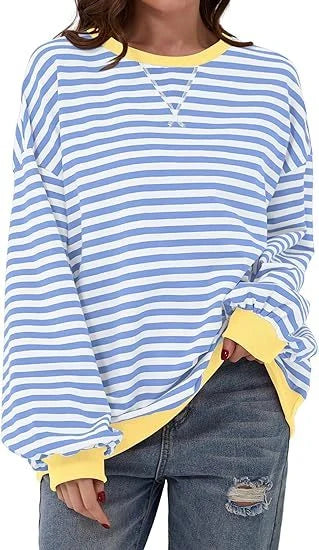 Striped sweatshirt in navy blue, pink, and orange with contrasting colours