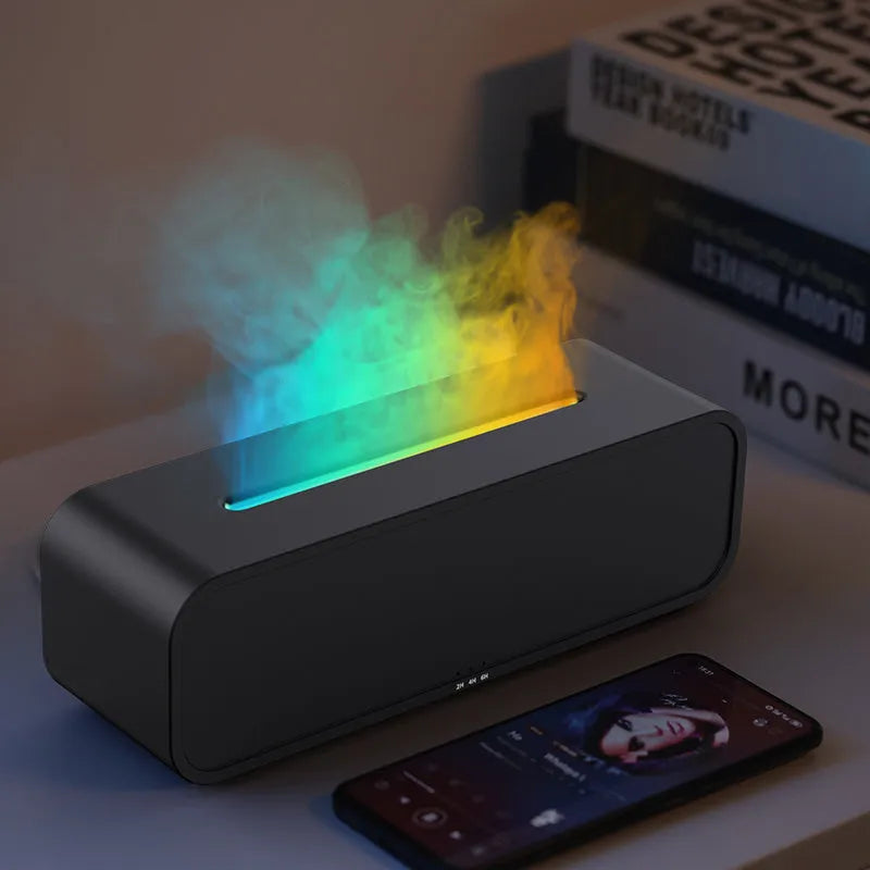 Black and white aroma diffuser with remote control showing colour-changing flame light effect