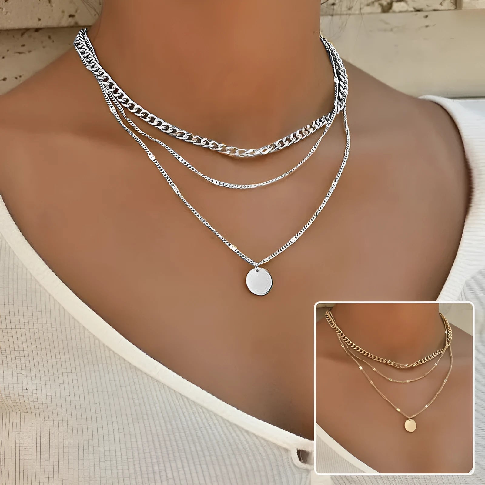 Women's multilayer disc pendant clavicle necklace in gold and silver colour finish on a light background