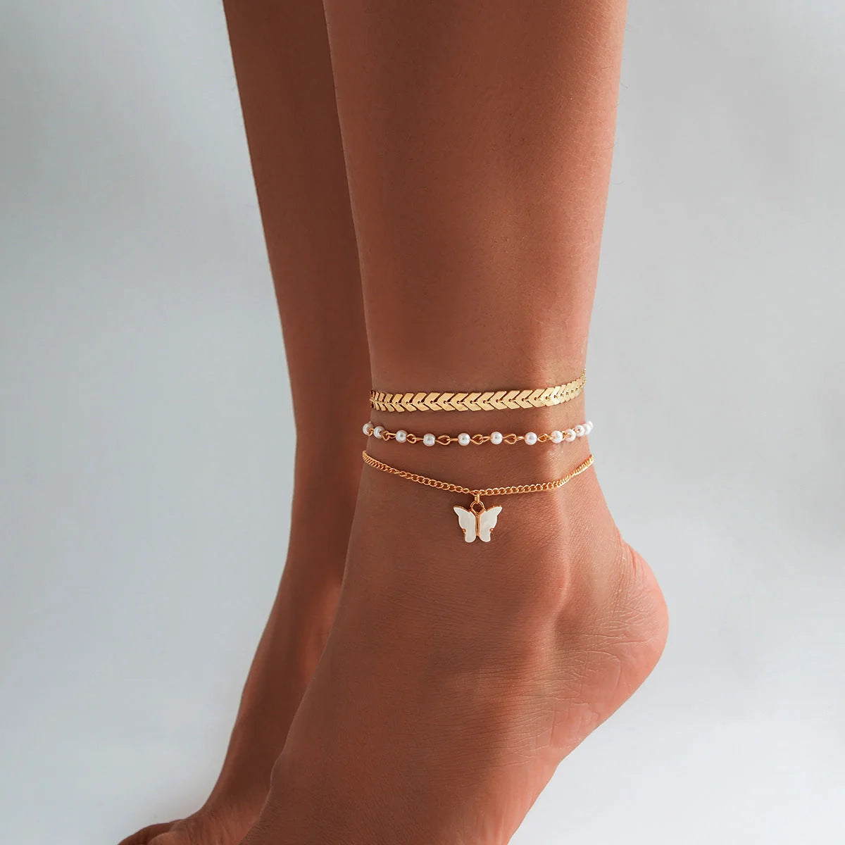 Beach Star Tassel Ankle Rings in gold and black, perfect for summer outfits