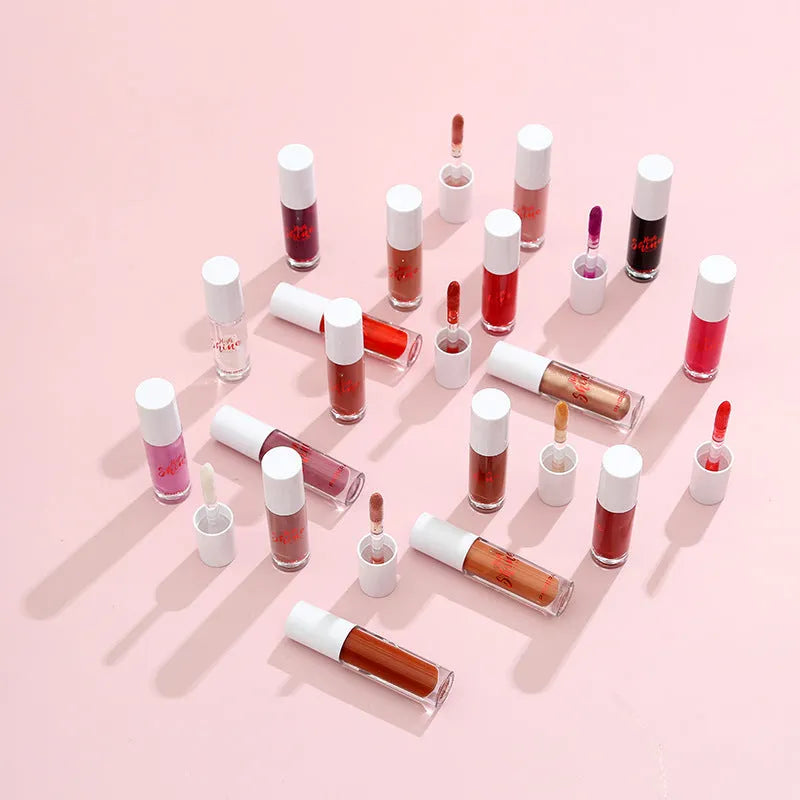 Solid jelly lip gloss in crystal pot with 24 colour options including clear, nude, and black water wave mirror finish