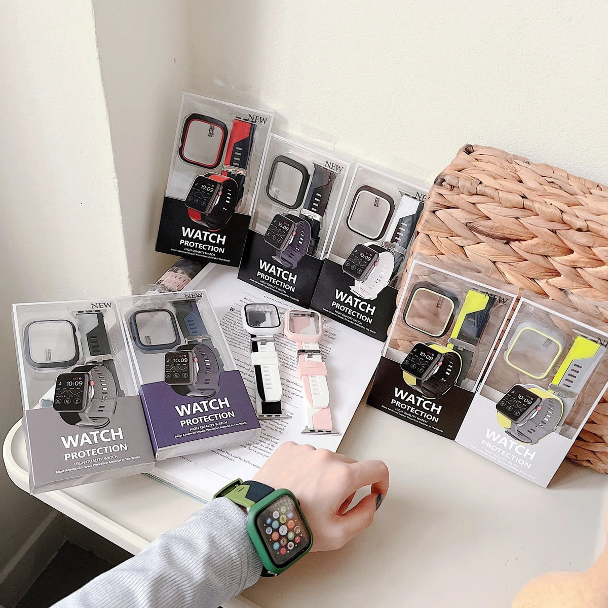 Silicone Apple Watch strap and matching protective case in black and white, two-tone design, for 44mm case size
