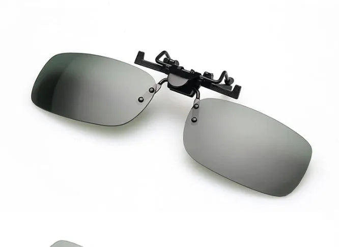 A polycarbonate clip-on sunglasses accessory for prescription glasses, shown in large and small frame sizes with grey, green, and night vision lenses.