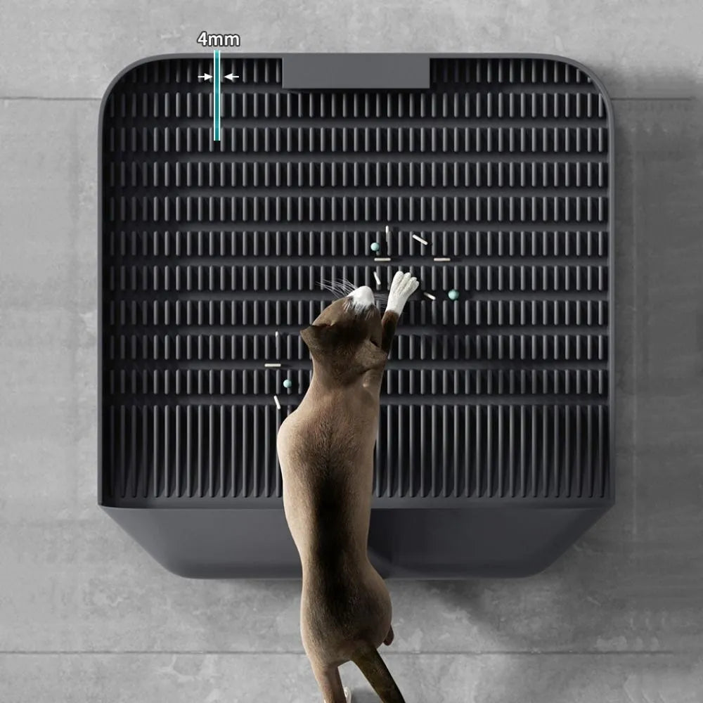 Large black cat litter pedal mat with slanted mouth design and textured surface