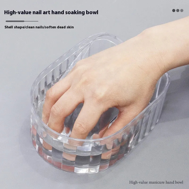 Plastic manicure bowl in transparent colour for nail soaking on white background