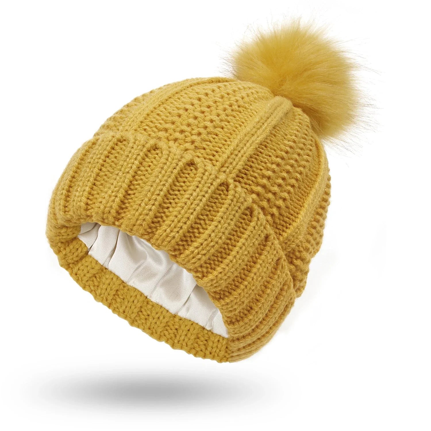 Wool skull knit beanie with satin lining and faux fur pom pom in various colours