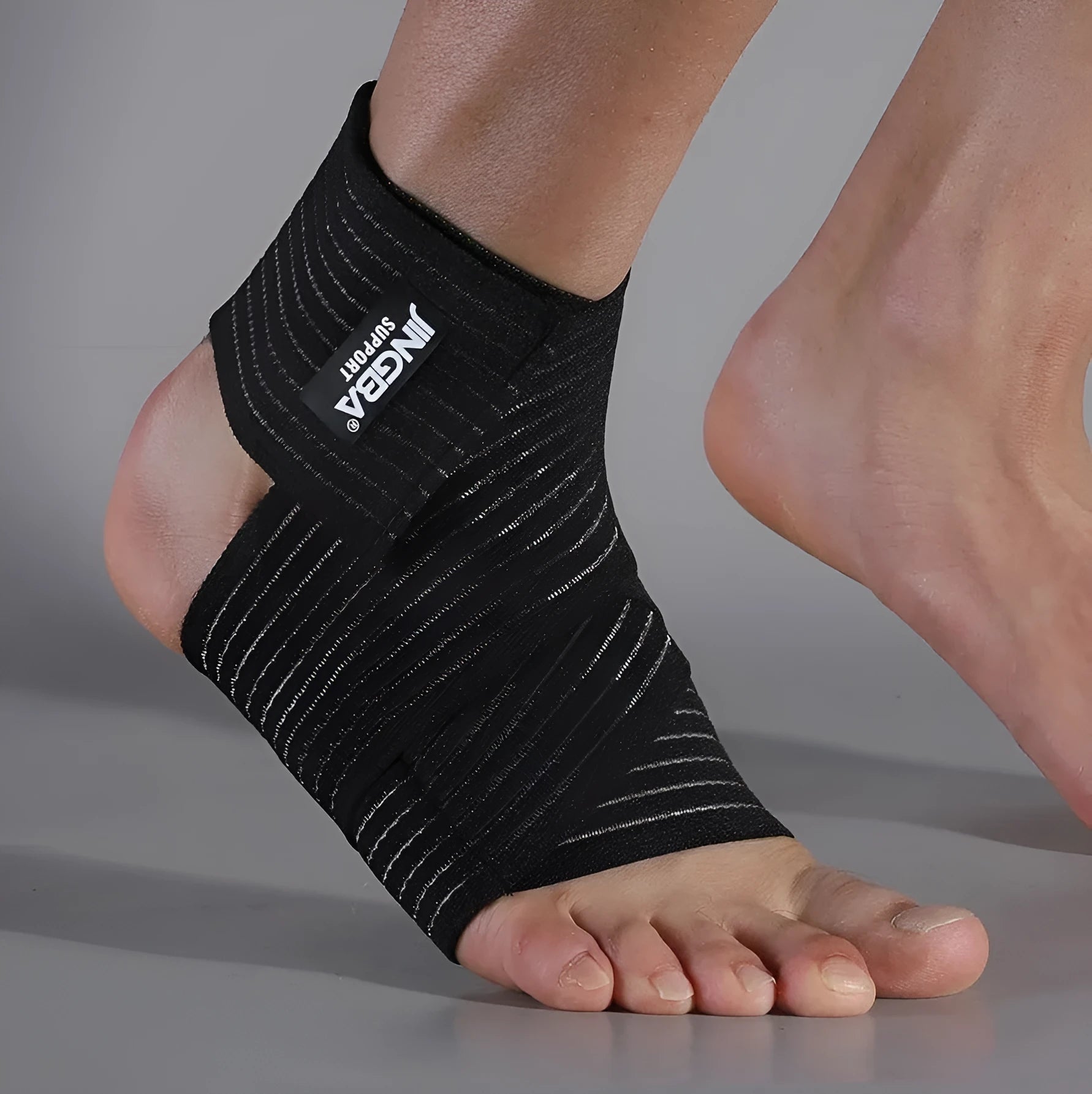 Adjustable black sports bandage ankle support for running and basketball