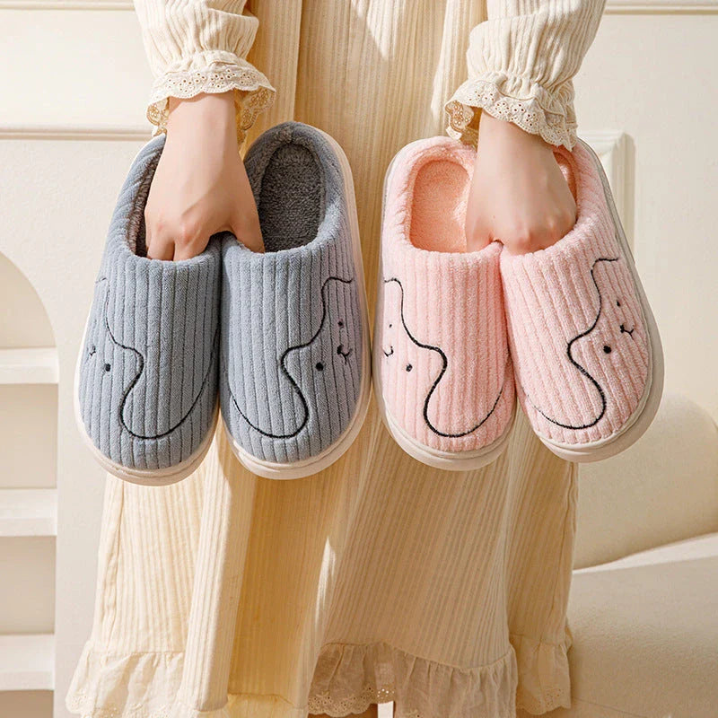 Cozy cat-themed slippers with plush uppers and non-slip rubber soles, available in a variety of vibrant colors