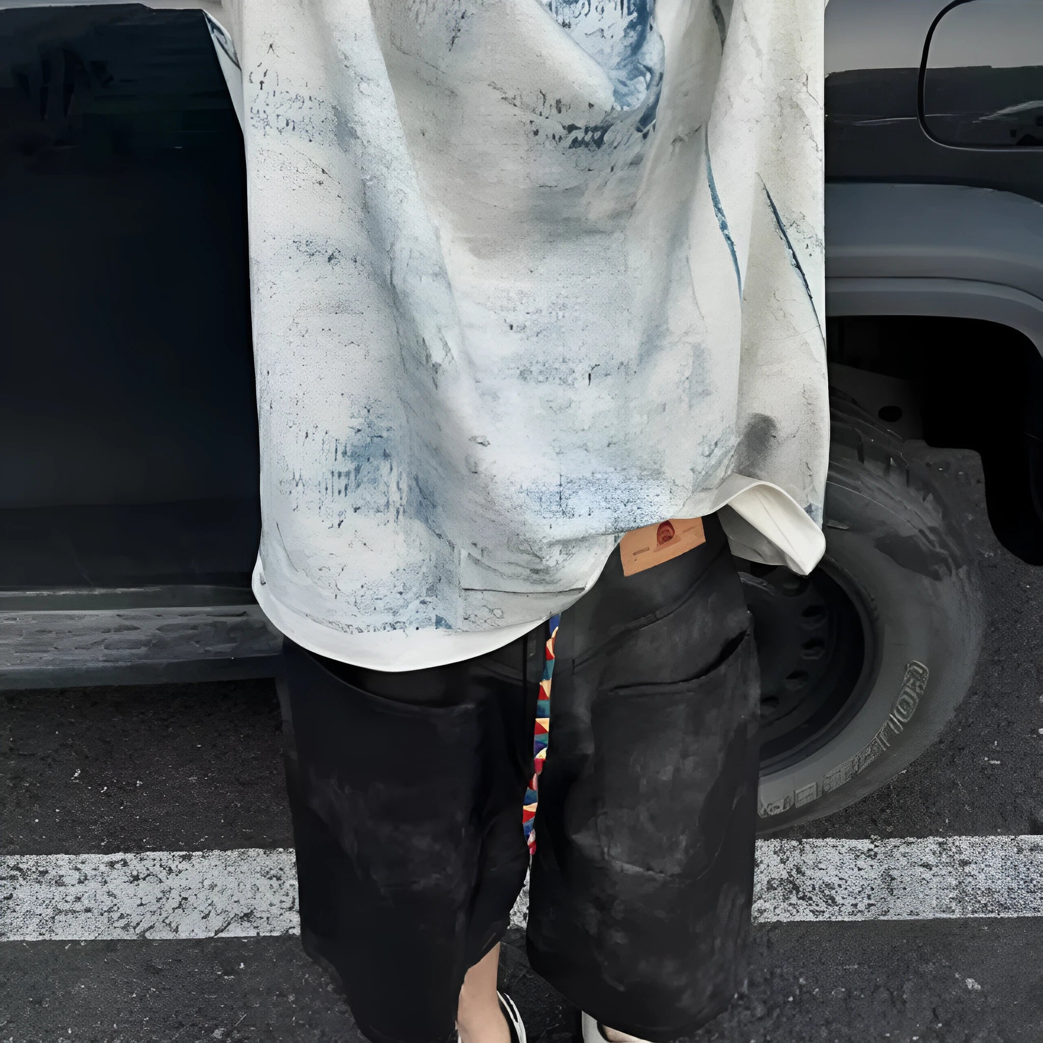 Korean loose-fit men's T-shirt with a full blue tie-dye print and short sleeves.