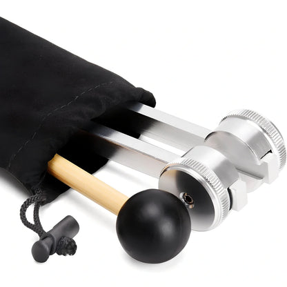 Silver 128 Hz weighted bio-acoustic tuning fork set with hammer, velvet pouch, and accessories for sound therapy