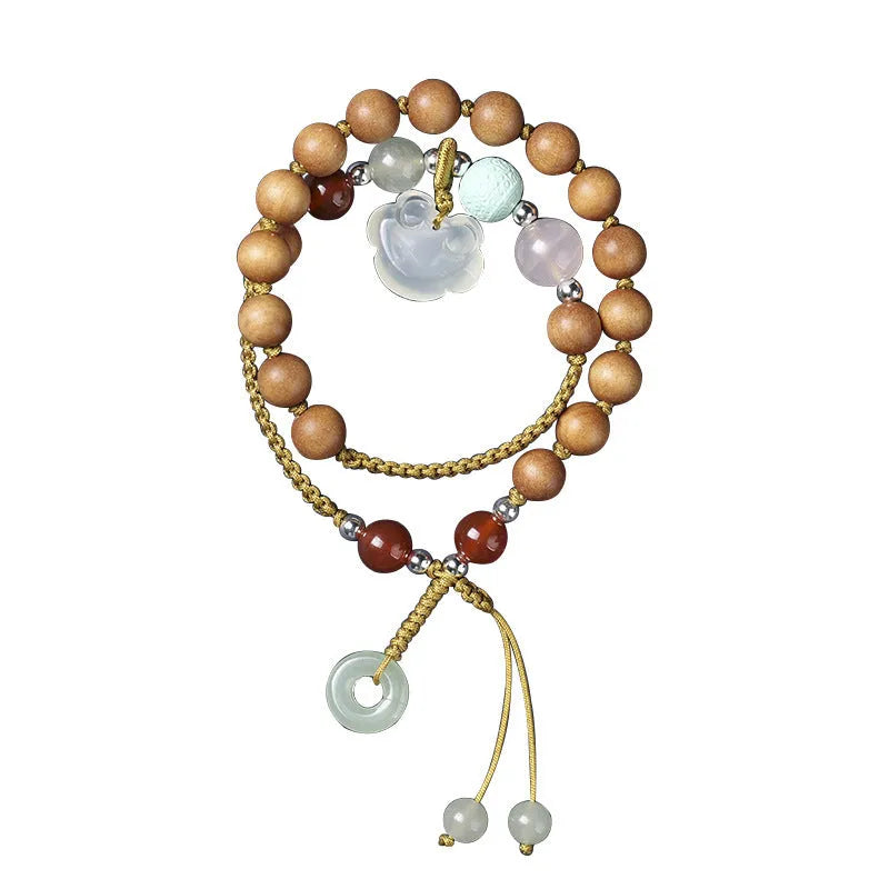 Hand-woven ebony wood bracelet with gemstone elements in double ring national style design