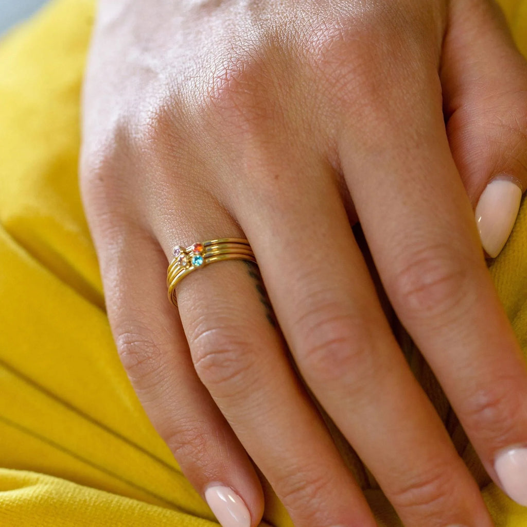 December birthstone engraved titanium steel ring with geometric shape and gold-plated handle.