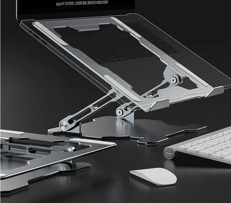 Grey aluminium laptop stand with adjustable angle, shown folded and unfolded next to a laptop.