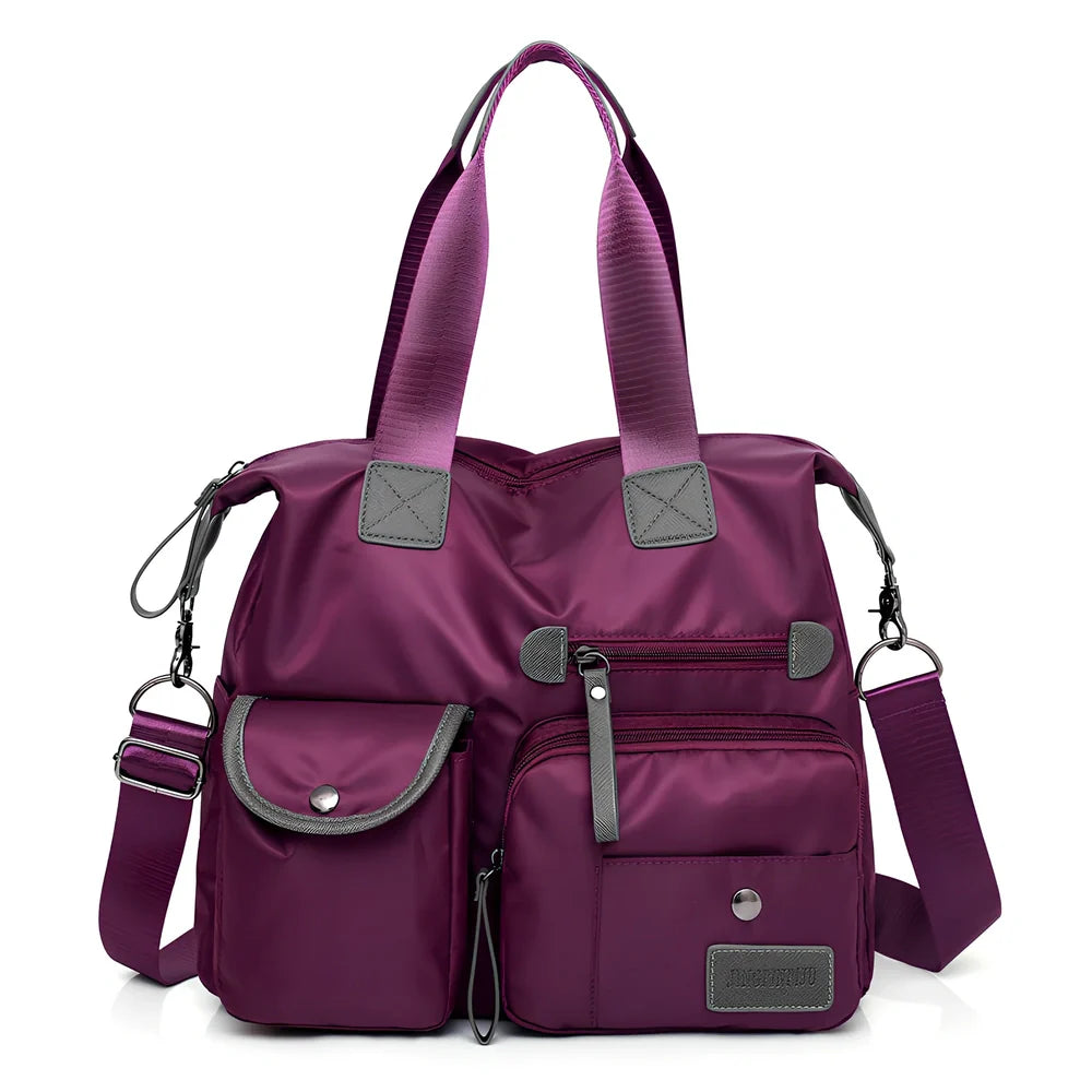 Ladies shoulder bag in black Oxford fabric, size M with multiple pockets and adjustable straps for handbag or crossbody carry, 340 mm width