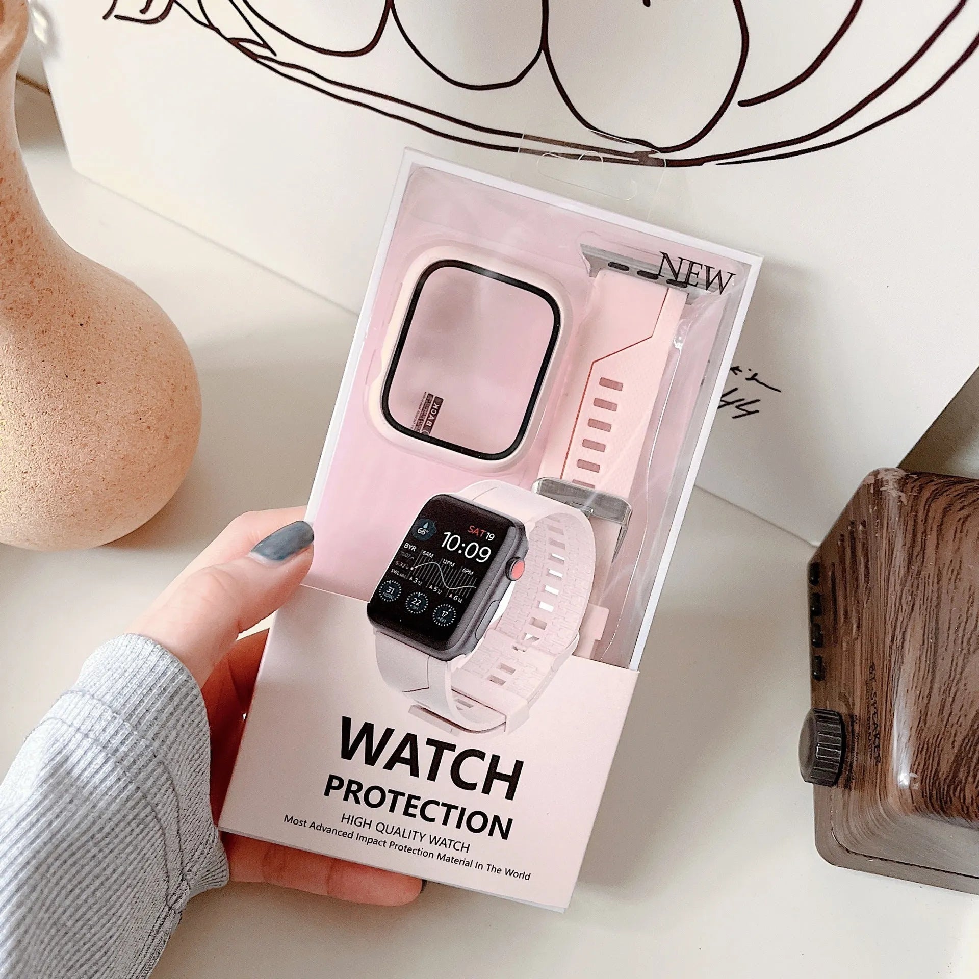 Silicone strap and watch case set in black, white, and blue colours showing flat 22mm interface for iWatch