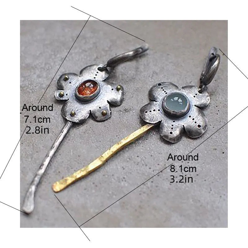 Long geometric flower earrings with retro styling and asymmetric two-colour electroplated finish